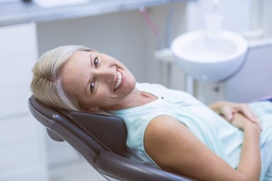 Dental Implants vs. Dentures: The Pros and Cons